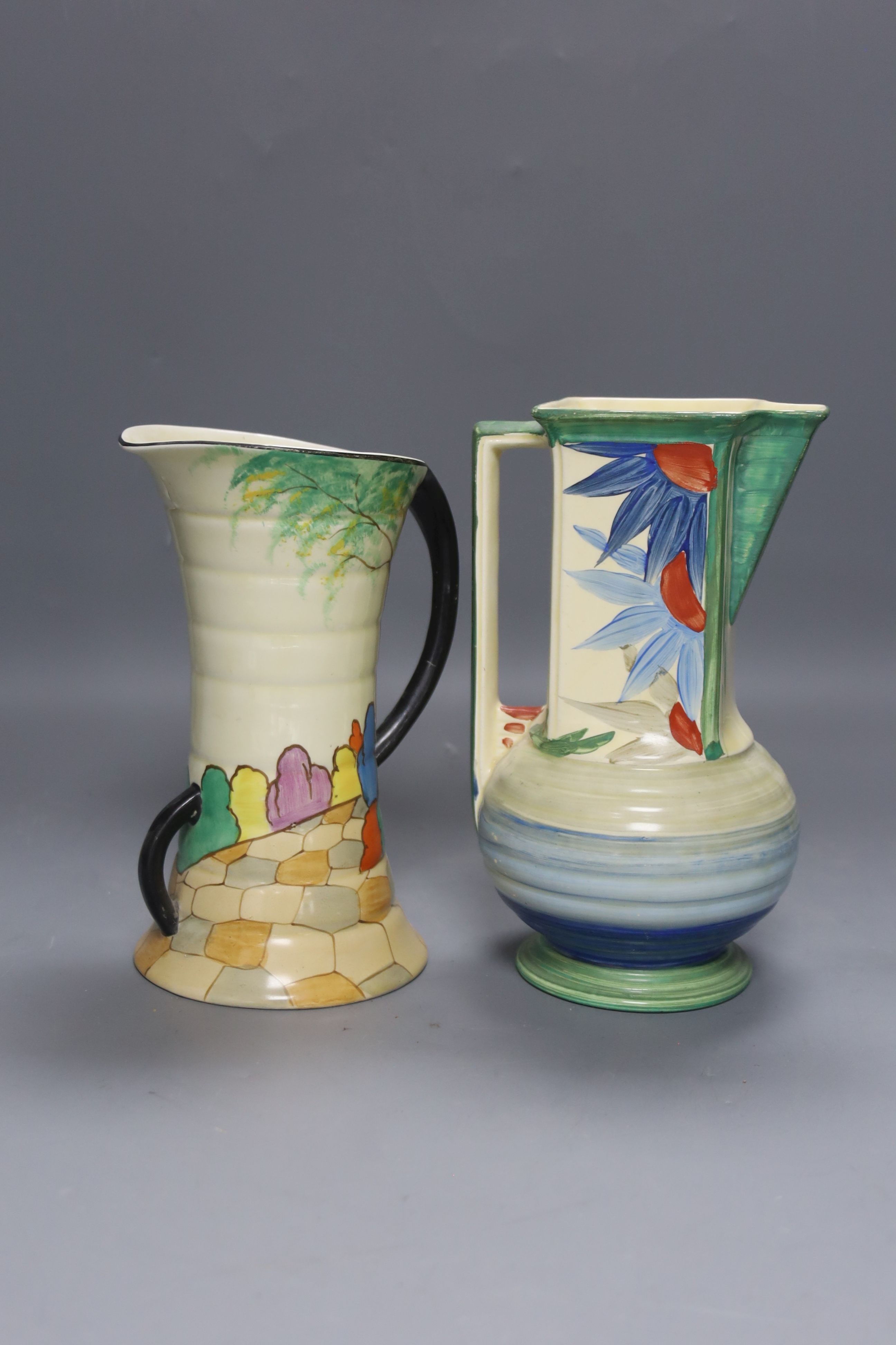An Art Deco style jug and vase, wall mask and Crown Devon dish
